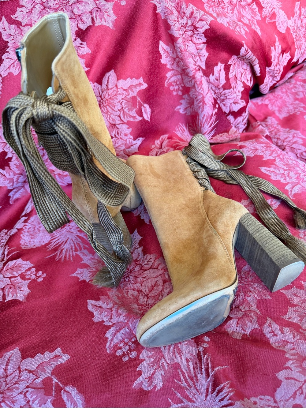 Chloé Harper ankle boots feature distinctive back lacing with thick laces